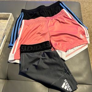 Women’s small adidas soccer shorts and short bikers to wear underneath.